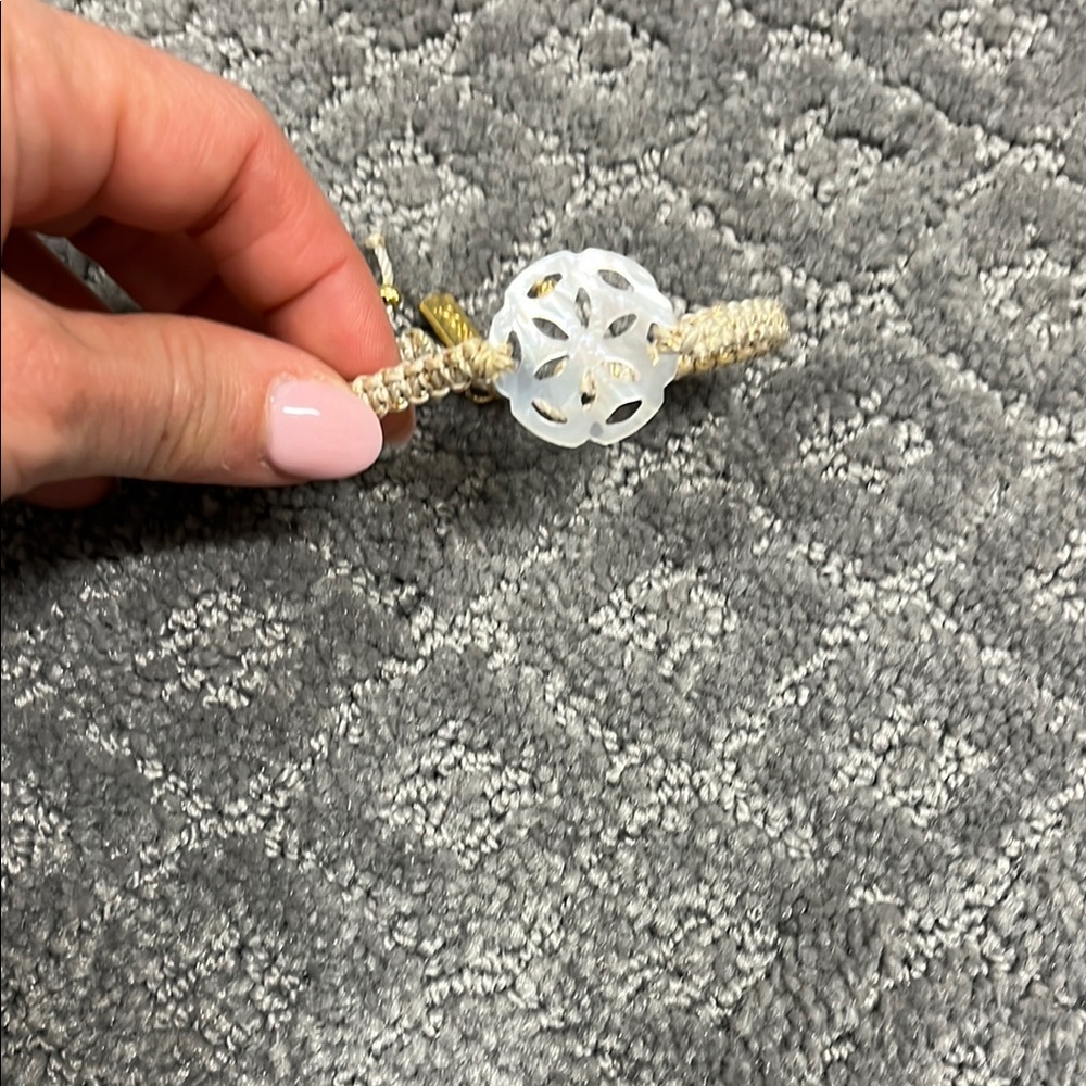 My Saint My Hero White Carved Bracelet with Tan Cord